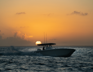 Best of the best 35 ft. center console cruising during sunset.