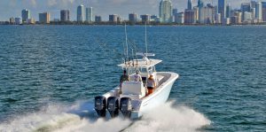 Invincible Boats 36" center console cruising back into the city.