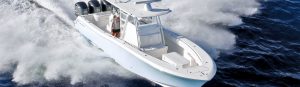 36 ft. center console with woman cruising through open ocean.