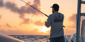 Man fishing on the premier Invincible center console.